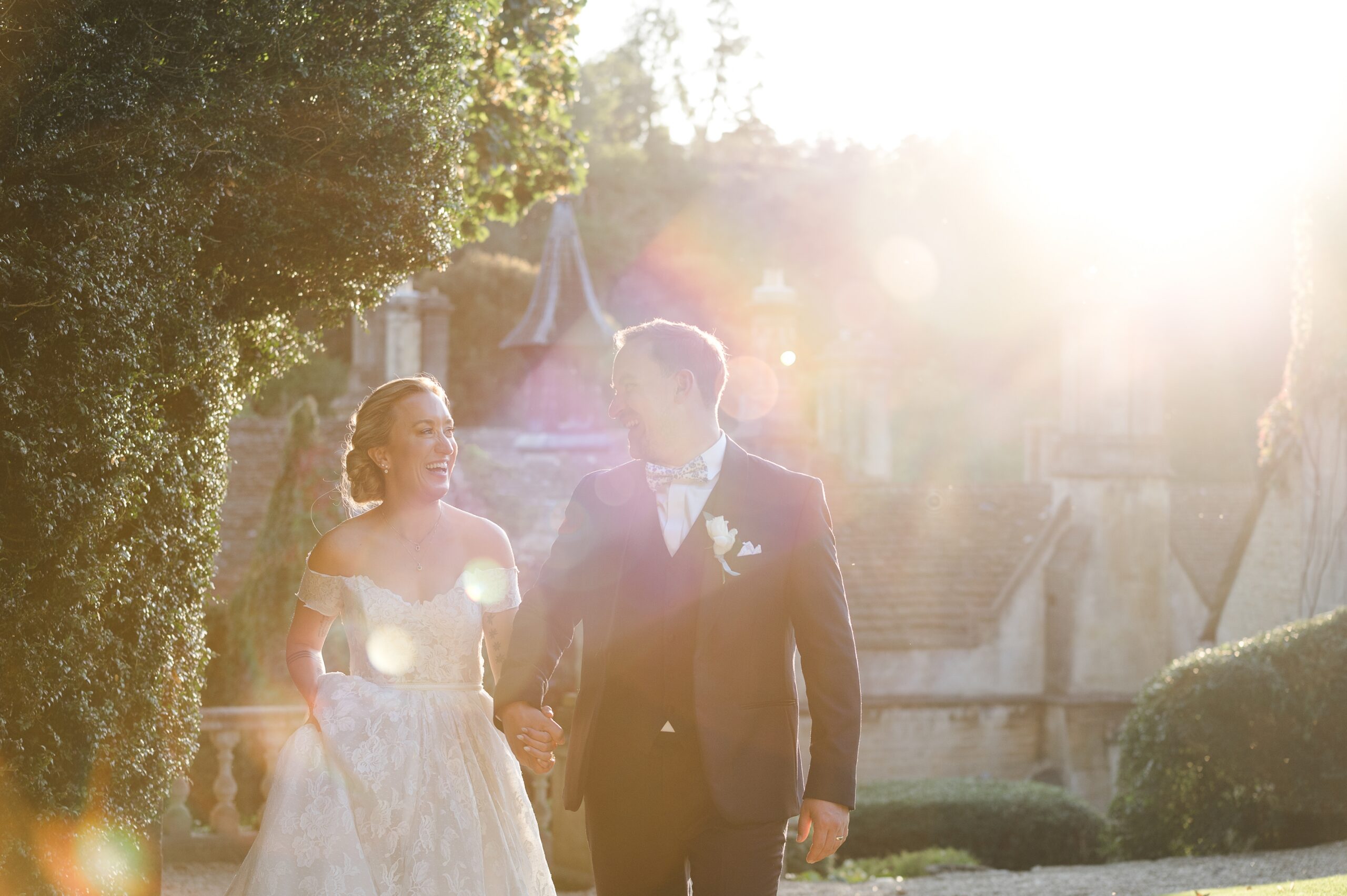 Emily & Bobby in the late evening golden light at The Manor House Castle Combe