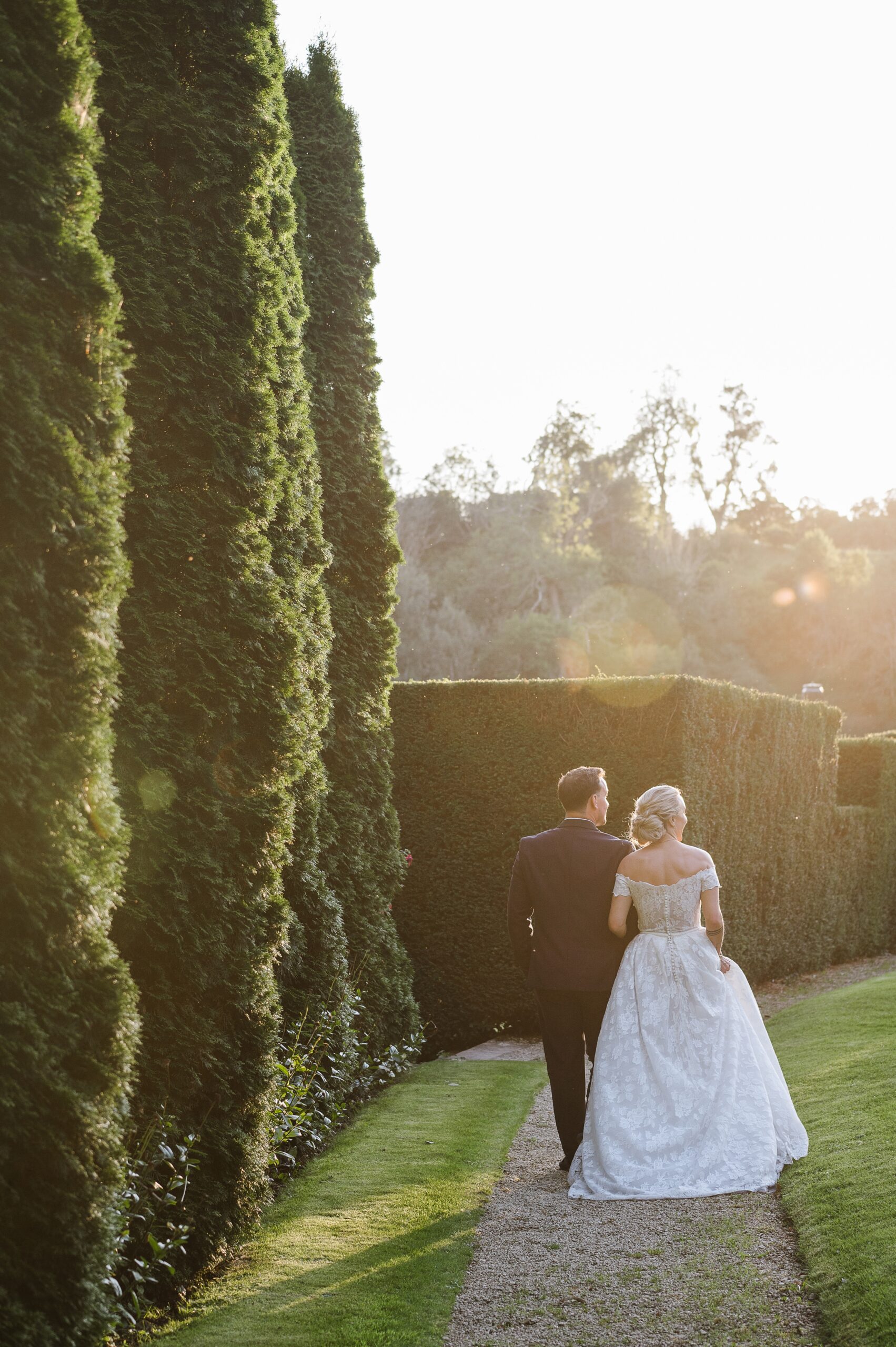 Sunset portraits of Emily and Bobby in the gardens of The Manor House in the Cotswolds.